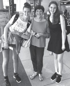 At the Charlotte airport leaving for France July 3 are (l-r) Ciara Rennicks, Jan Collins, and Emma Rennicks.